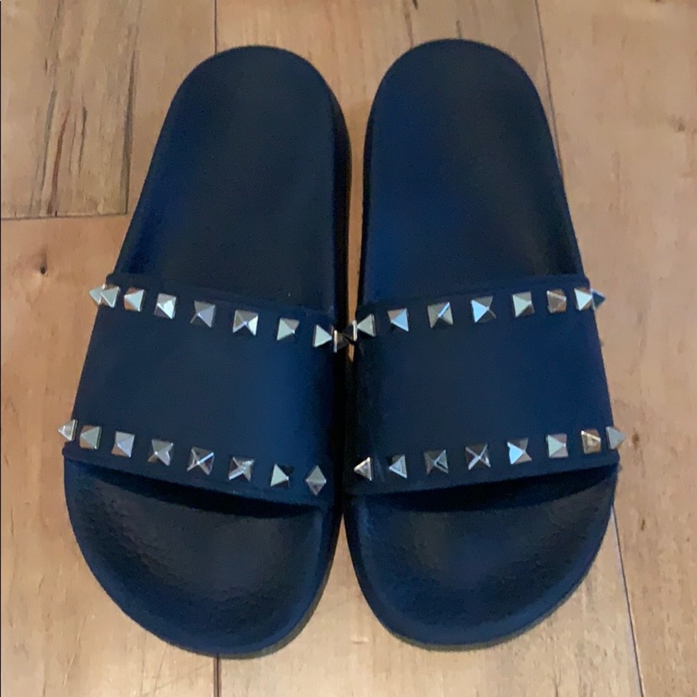 Valentino rockstud slides black size 38 (I’m a size 7 and they fit perfectly).